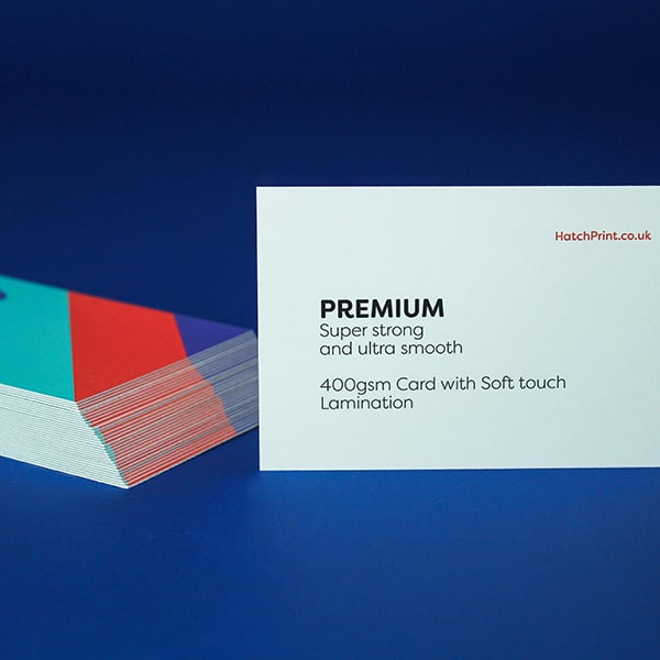 2 stacks of business cards, showing front and back design with geometrical lines. Representing 400gsm silk line of business cards from Hatch.