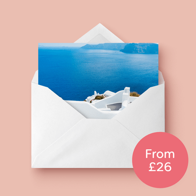 A greeting card printed by Hatch, popping out from a blank envelope and a circle next to it with words ‘from £26’ inside